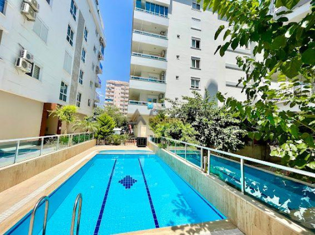 Апартаменты планировки 2+1, 110м2 в центре района Махмутлар - Ракурс 8