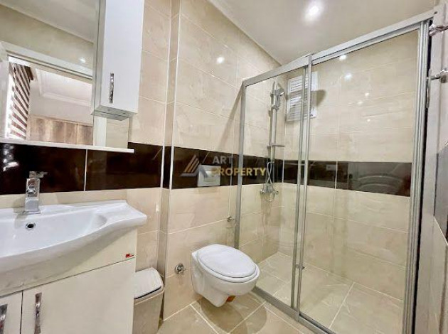 Апартаменты планировки 2+1, 110м2 в центре района Махмутлар - Ракурс 9