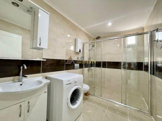 Апартаменты планировки 2+1, 110м2 в центре района Махмутлар - Ракурс 10