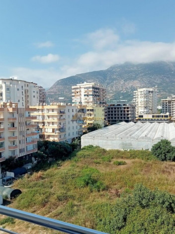 Меблированная квартира планировки 1+1, 60м2 в районе Махмутлар - Ракурс 20