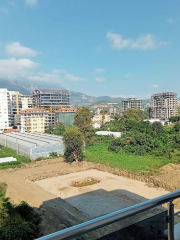 Меблированная квартира планировки 1+1, 60м2 в районе Махмутлар - Ракурс 21