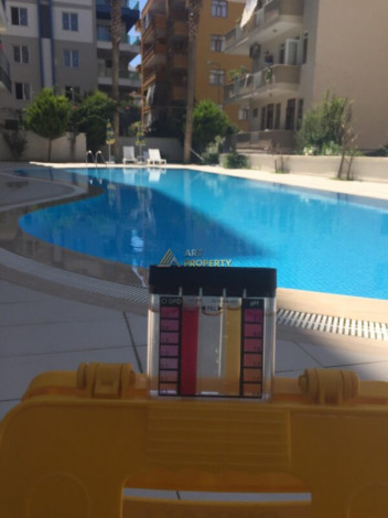 Меблированная квартира планировки 1+1, 65м2 в районе Махмутлар - Ракурс 5