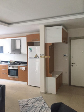 Меблированная квартира планировки 1+1, 65м2 в районе Махмутлар - Ракурс 6