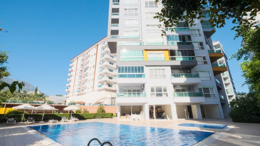 Просторная меблированная квартира планировки 1+1, 70м2 в районе Махмутлар - Ракурс 8