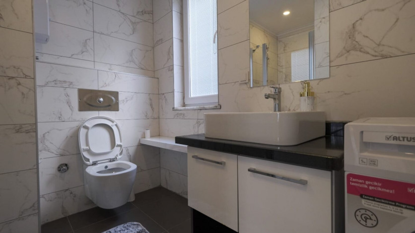 Просторная меблированная квартира планировки 1+1, 70м2 в районе Махмутлар - Ракурс 18