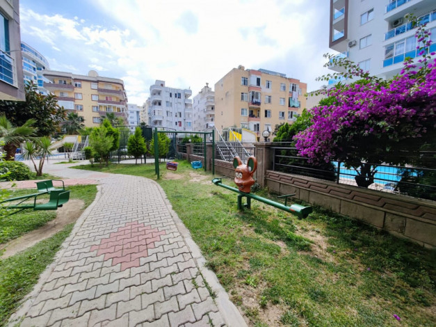 Просторная меблированная квартира планировки 1+1, 80м2 в районе Махмутлар - Ракурс 2