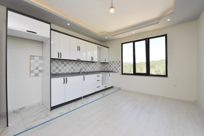 Новые апартаменты планировок 1+1, 2+1 в новом ЖК, районо Авсаллар - Ракурс 8