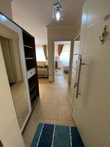 Меблированная квартира планировки 1+1, 75м2 в районе Махмутлар - Ракурс 18