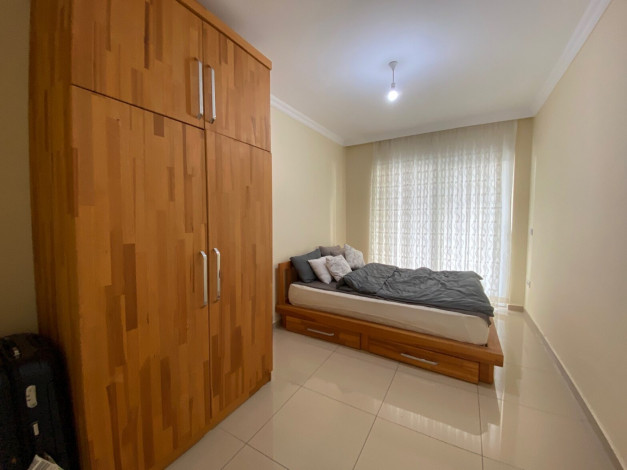 Просторная меблированная квартира планировки 1+1, 75м2 в районе Авсаллар - Ракурс 9