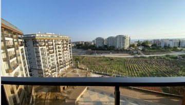 Роскошные меблированные апартаменты планировки 2+1 с видом на море, район Авсаллар - Ракурс 8
