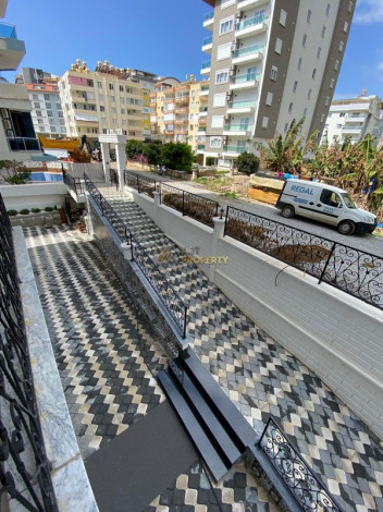 Двухкомнатная квартира в новом комплексе в Махмутларе в 250 метрах от Средиземного моря, 65 м2 - Ракурс 6