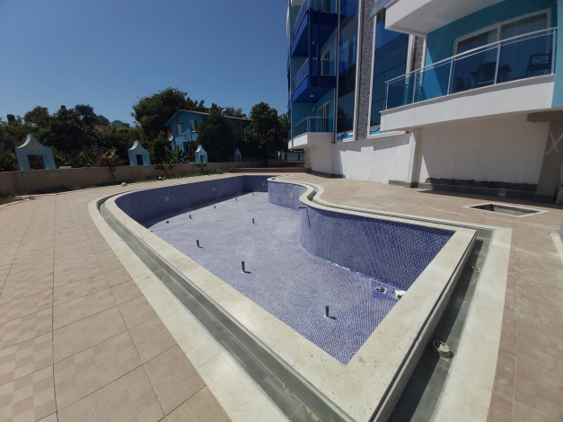 Двухкомнатная квартира в новом доме в Махмутлар, 55 м2 - Ракурс 3