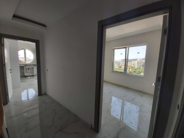 Двухкомнатная квартира в новом доме в Махмутлар, 55 м2 - Ракурс 17