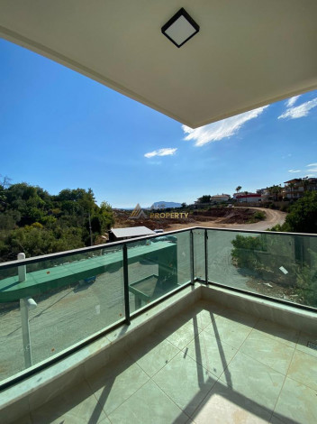 Меблированная квартира планировки 1+1, 65м2 в районе Оба - Ракурс 9