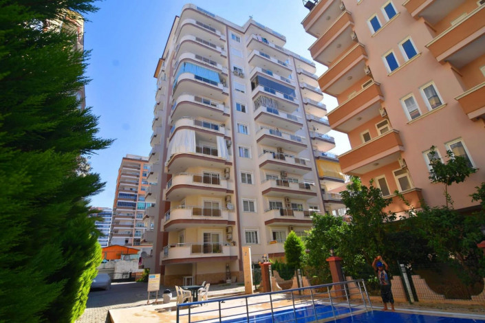 Двухкомнатная квартира в районе Махмутлар, Алания, рядом с вторничным  рынком, 65 м2. - Ракурс 6