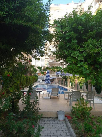 Двухкомнатная квартира в районе Махмутлар, Алания, рядом с вторничным  рынком, 65 м2. - Ракурс 17