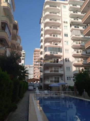 Двухкомнатная квартира в районе Махмутлар, Алания, рядом с вторничным  рынком, 65 м2. - Ракурс 24