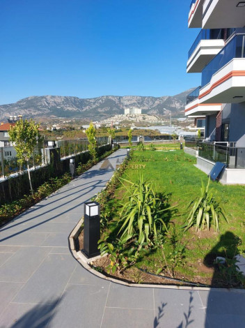 Меблированная квартира планировки 1+1, 60м2 в районе Каргыджак - Ракурс 9