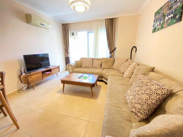 Меблированная квартира планировки 1+1, 65м2 в районе Махмутлар - Ракурс 13