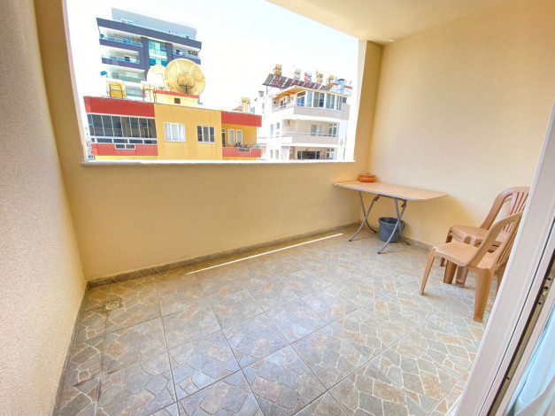 Меблированная квартира планировки 1+1, 65м2 в районе Махмутлар - Ракурс 14