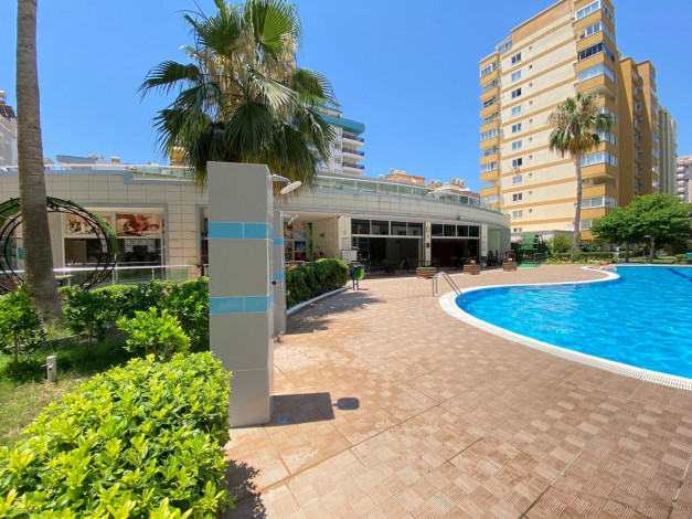 Меблированная квартира планировки 1+1, 65м2 в районе Махмутлар - Ракурс 20