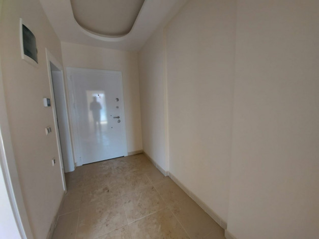 Двухкомнатная квартира в Махмутларе в 150 метрах от Средиземного моря, 68 м2 - Ракурс 2