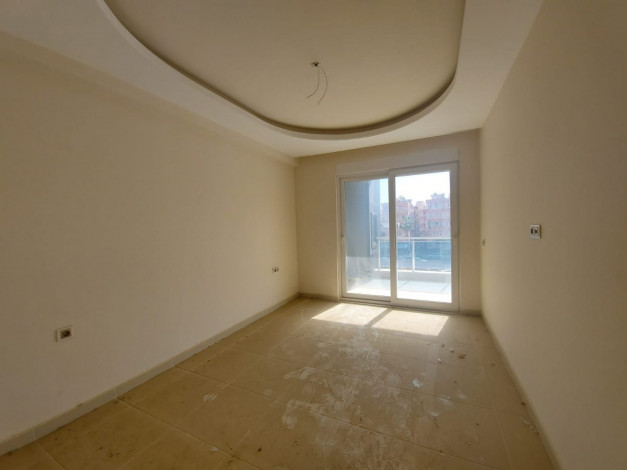 Двухкомнатная квартира в Махмутларе в 150 метрах от Средиземного моря, 68 м2 - Ракурс 3