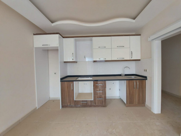 Двухкомнатная квартира в Махмутларе в 150 метрах от Средиземного моря, 68 м2 - Ракурс 6