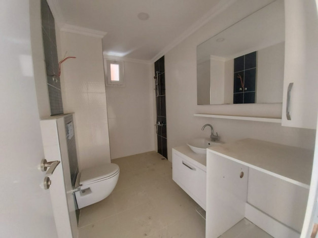 Двухкомнатная квартира в Махмутларе в 150 метрах от Средиземного моря, 68 м2 - Ракурс 7