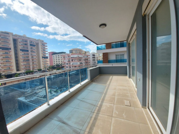 Двухкомнатная квартира в Махмутларе в 150 метрах от Средиземного моря, 68 м2 - Ракурс 9