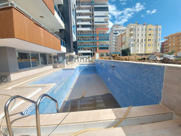 Двухкомнатная квартира в Махмутларе в 150 метрах от Средиземного моря, 68 м2 - Ракурс 10