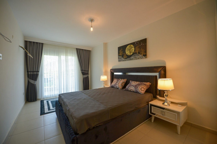 Просторная меблированная  квартира планировки  2+1, с видом на горы в Махмутларе, 105 м2. - Ракурс 2