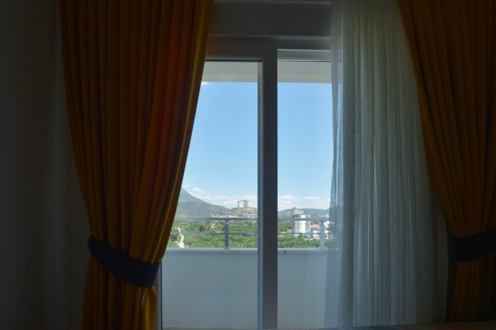 Просторная меблированная  квартира планировки  2+1, с видом на горы в Махмутларе, 105 м2. - Ракурс 10