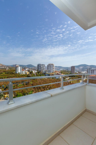 Просторная меблированная  квартира планировки  2+1, с видом на горы в Махмутларе, 105 м2. - Ракурс 19