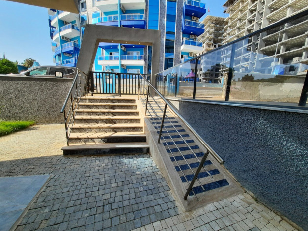 Меблированная квартира планировки 1+1, 55м2 в новом жилом комплексе, Махмутлар - Ракурс 12