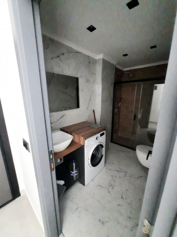 Меблированная квартира планировки 1+1, 55м2 в новом жилом комплексе, Махмутлар - Ракурс 17