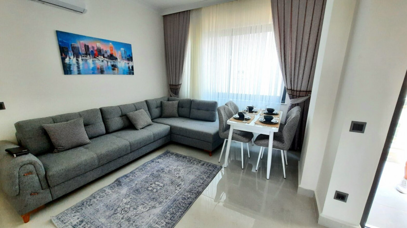 Меблированная квартира планировки 1+1, 55м2 в новом жилом комплексе, Махмутлар - Ракурс 19