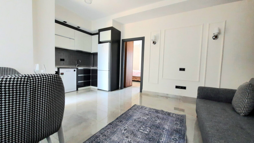 Меблированная квартира планировки 1+1, 55м2 в новом жилом комплексе, Махмутлар - Ракурс 26