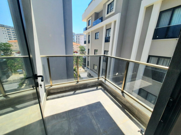 Меблированная квартира планировки 1+1, 55м2 в новом жилом комплексе, Махмутлар - Ракурс 45