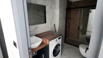 Меблированная квартира планировки 1+1, 55м2 в новом жилом комплексе, Махмутлар - Ракурс 47