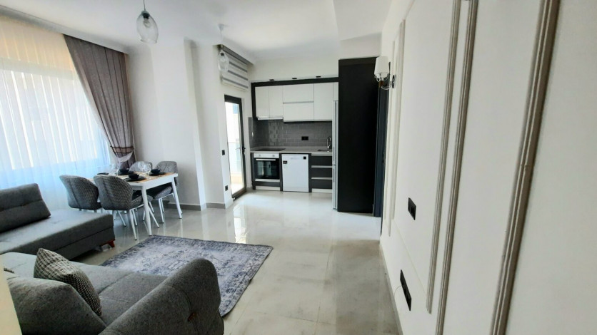 Меблированная квартира планировки 1+1, 55м2 в новом жилом комплексе, Махмутлар - Ракурс 57