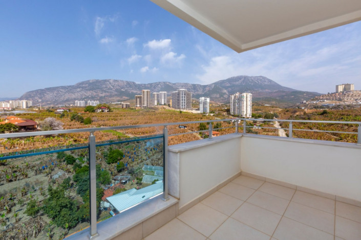 Просторная меблированная  квартира планировки  2+1, с видом на горы в Махмутларе, 105 м2. - Ракурс 24