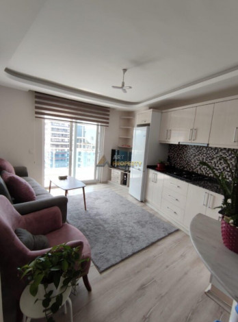 Уютная меблированная квартира планировки 1+1, 55м2 в районе Махмутлар - Ракурс 9