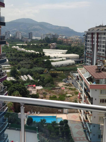 Уютная меблированная квартира планировки 1+1, 55м2 в районе Махмутлар - Ракурс 11