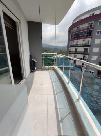 Уютная меблированная квартира планировки 1+1, 55м2 в районе Махмутлар - Ракурс 12