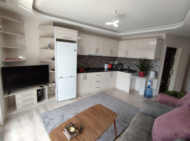 Уютная меблированная квартира планировки 1+1, 55м2 в районе Махмутлар - Ракурс 13