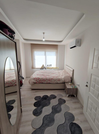 Уютная меблированная квартира планировки 1+1, 55м2 в районе Махмутлар - Ракурс 14