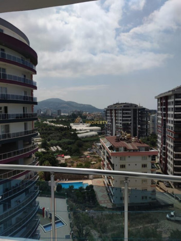 Уютная меблированная квартира планировки 1+1, 55м2 в районе Махмутлар - Ракурс 18