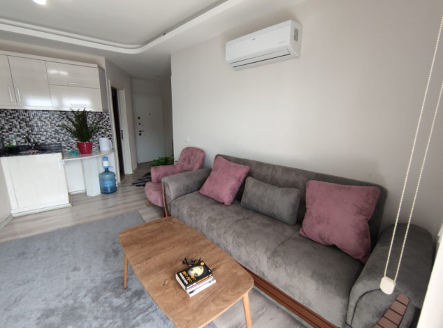 Уютная меблированная квартира планировки 1+1, 55м2 в районе Махмутлар - Ракурс 22