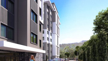 Новый инвестиционный проект с апартаментами 1+1, 2+1, 3+1 в районе Авсаллар - Ракурс 12